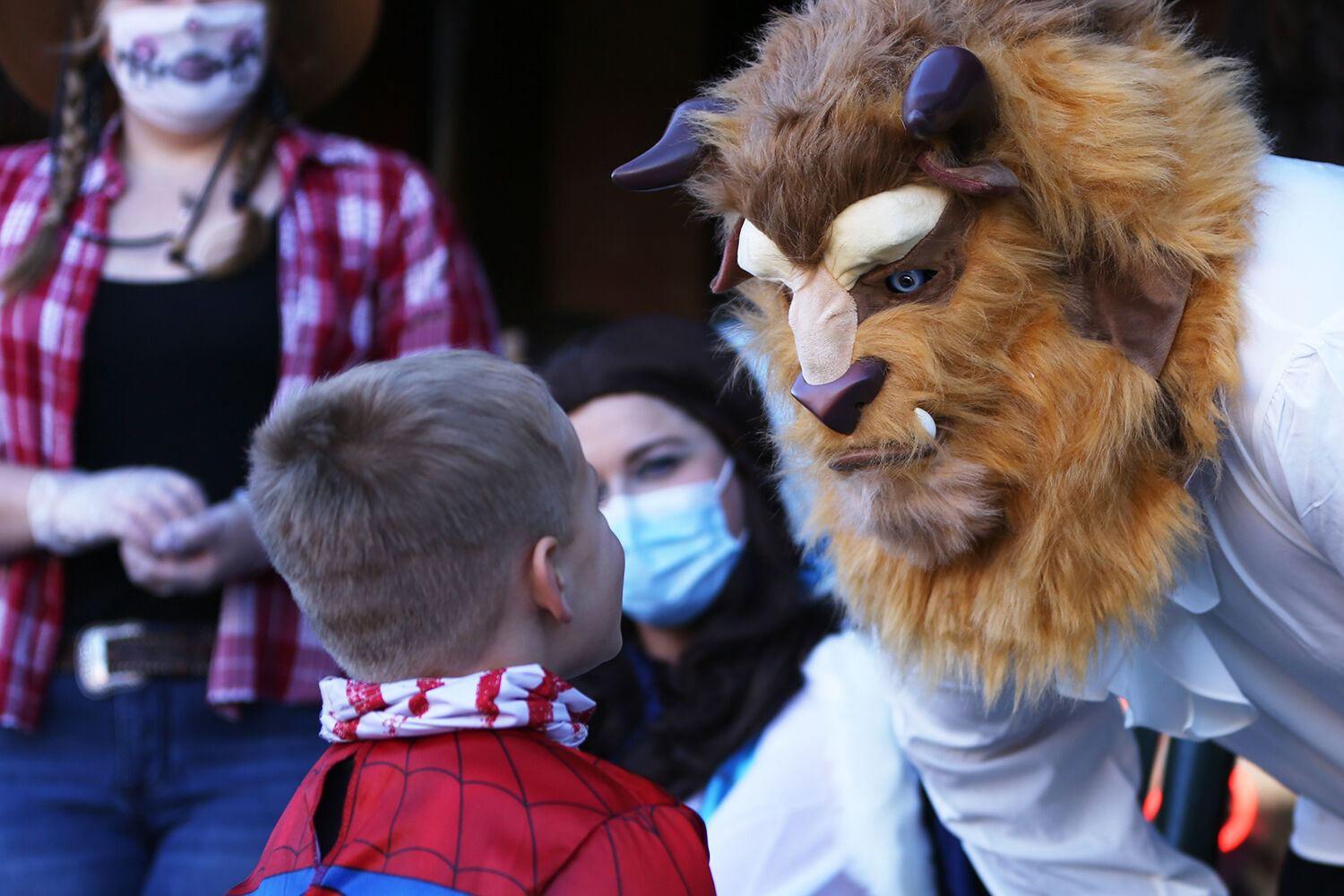 Wyatt Sommers, 4, talks with the Beast outside of the Occidental